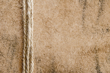 String over antique paper background