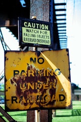 Streetsign No parking under railroad