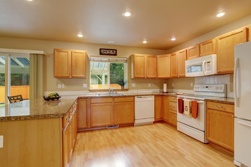 Classic kitchen with hardwood floor.
