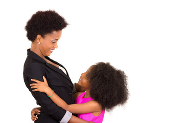 Black mother daughter posing happily