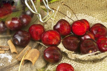 Domestic production of cherry jam. Freshly picked cherries ready for canning. The supply of fruits for the winter and a rainy day. The preparation of sweets for the family.
