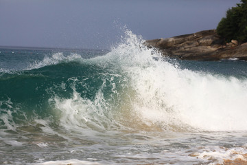 sea wave coast surf foam blue background