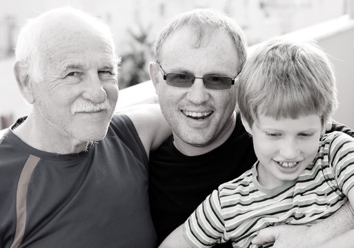 Grandfather With Adult Son And Grandchild