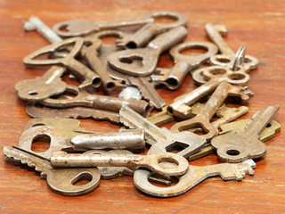 A lot of old metal keys closeup.