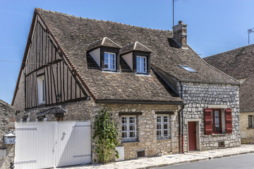 Old stone house near city wall in Provins. France.