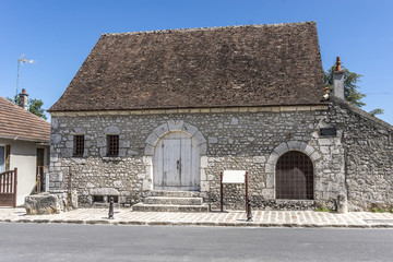 Fototapeta na wymiar Old stone house near city wall in Provins. France.