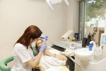 Female patient at dentists office
