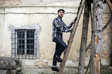 Confident man posing in selvedge  jeans