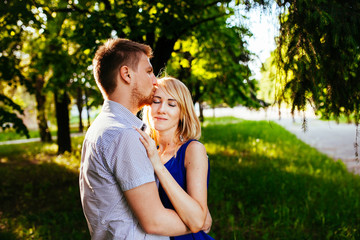 Obraz premium Happy Couple Relaxing in the Park.