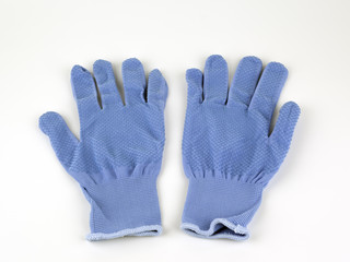 Fabric work gloves on a white background