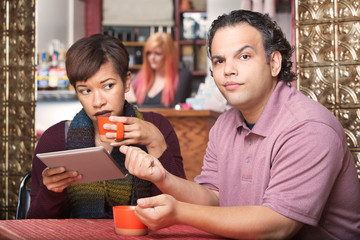 Hispanic Woman Ignoring Boyfriend