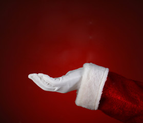 Santa Hand Over Red Palm Up