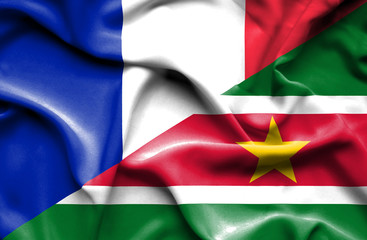 Waving flag of Suriname and France