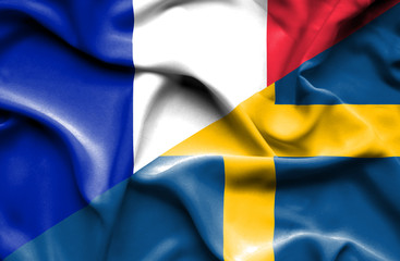Waving flag of Sweden and France