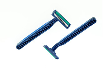 Close up new blue shaver isolated on white