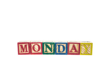 Monday written in letter colorful alphabet blocks isolated on wh