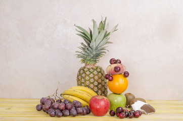 Fresh fruit baskets on wood.