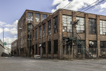 Fototapeta na wymiar Old Abandoned Building with Broken Windows