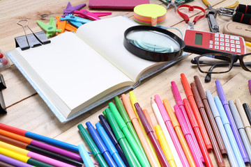 School and office stationary on wood table .  Back to school concept
