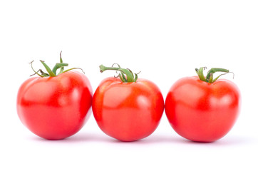 Fresh tomatoes on white background