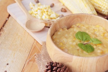 Corn soup of condensed in a wooden bowl