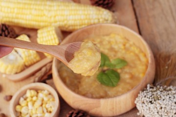 Corn soup of condensed in a wooden bowl