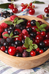 Vitamin salad of fresh berries closeup. Vertical

