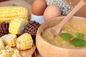Corn soup of condensed in a wooden bowl