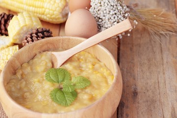 Corn soup of condensed in a wooden bowl