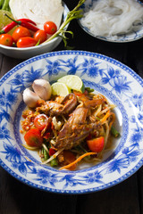 spicy papaya salad with salted crab and fermented fish