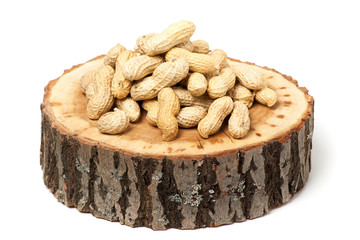 Pile of unshelled peanuts, isolated on white background
