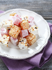 Eastern sweets on wooden background