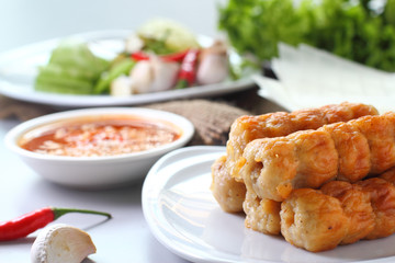 Vietnamese meatball wraps with vegetables (Nam-Neaung)