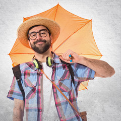 Tourist holding an umbrella