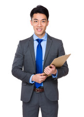 Young businessman hold with clipboard