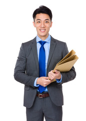 Businessman holding with folder