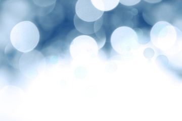 Abstract blue bokeh circles background. White copy space