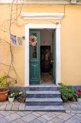 Fototapeta na wymiar Entrance of an old building in the town of Corfu island, Greece