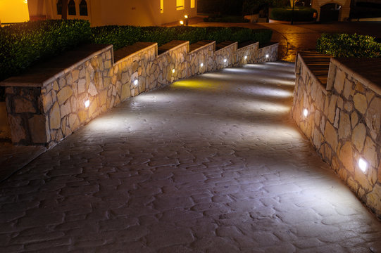 Fototapeta Night lighting path for walks in the hotel