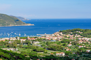 Naklejka na ściany i meble Isola d'Elba, Marina di Campo (Italy) view from Sant'Ilario