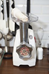 Meat grinder close up, preparation of forcemeat