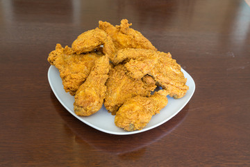 Fresh Fried Chicken on Shiny Table