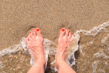 Ocean Sea Waves And Girl Feet On Summer Sand Beach