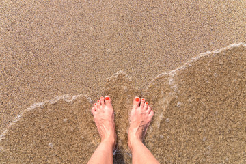 Ocean Sea Waves And Girl Feet On Summer Sand Beach