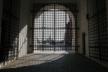 monastery gate, a narrow door the lattice