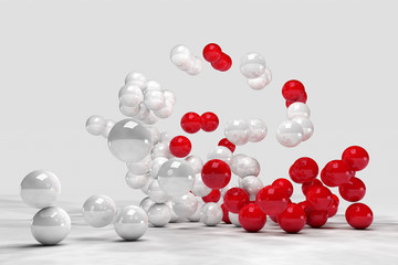Lots of white and red balls interact. 3D render image. © marinv