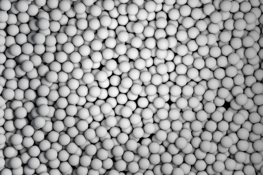 Many small white balls randomly arranged. 3d render image.