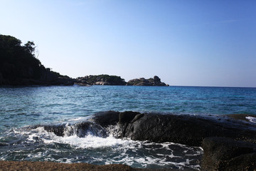 surf on a sandy beach paradise island