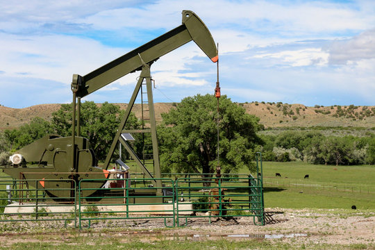 Close up of an oil pumpjack in the countryside of northern New Mexico