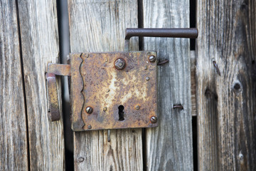 old wooden entrance door with antique door handle